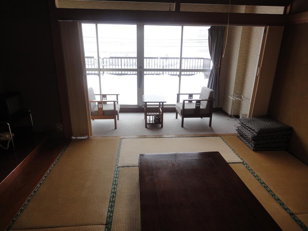 Hotel Tomiya Юдзава Номер фото